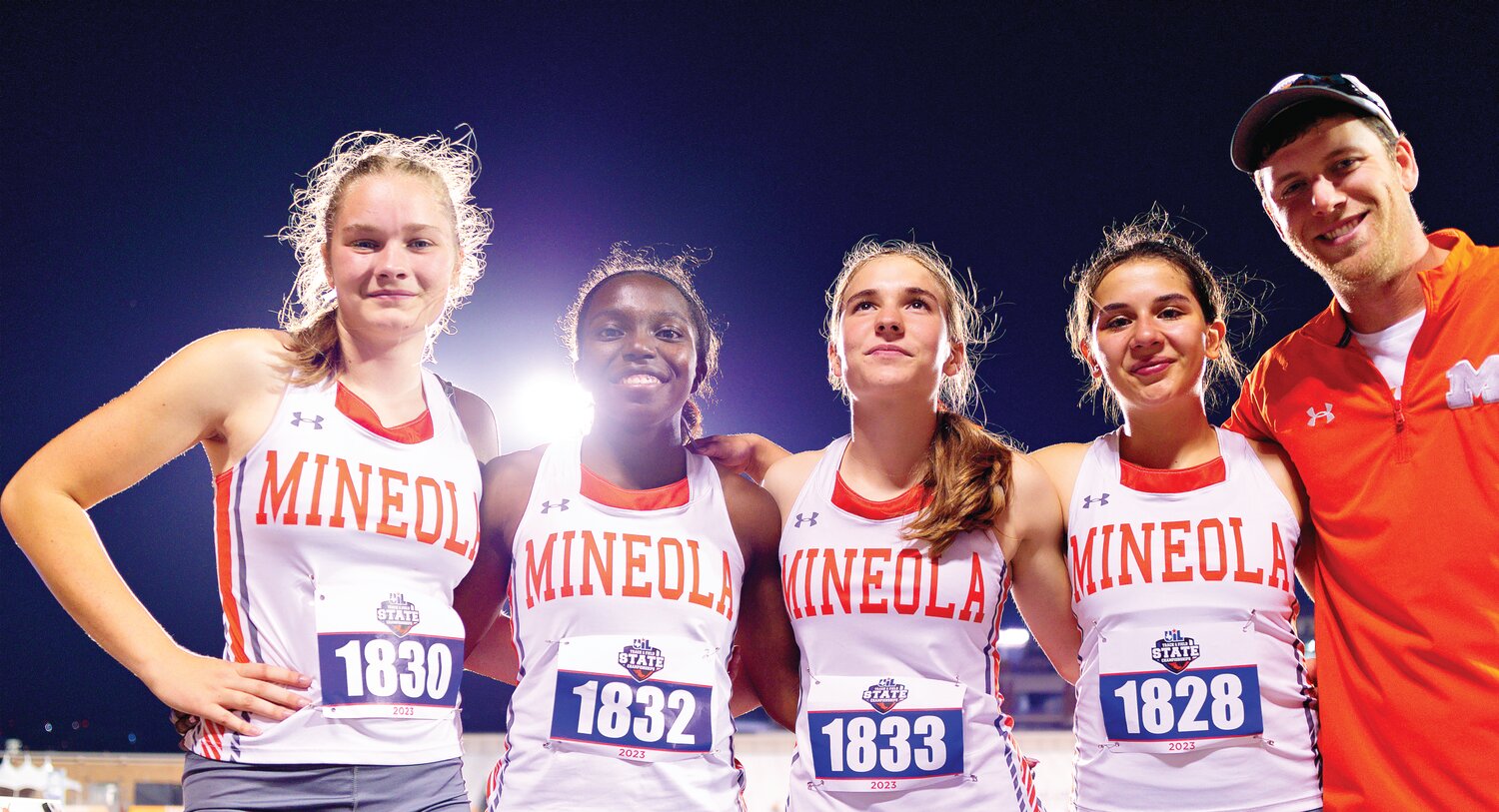The Mineola Lady Jacket 1600-meter relay team, from left, Tanner Hartzog, Shylah Kratzmeyer, Raylie Peebles and Carmen Carrasco, with Coach Daven Murphree, after their race in Austin Thursday. They set a goal to return to the state meet after qualifying last year. [view more relay running]